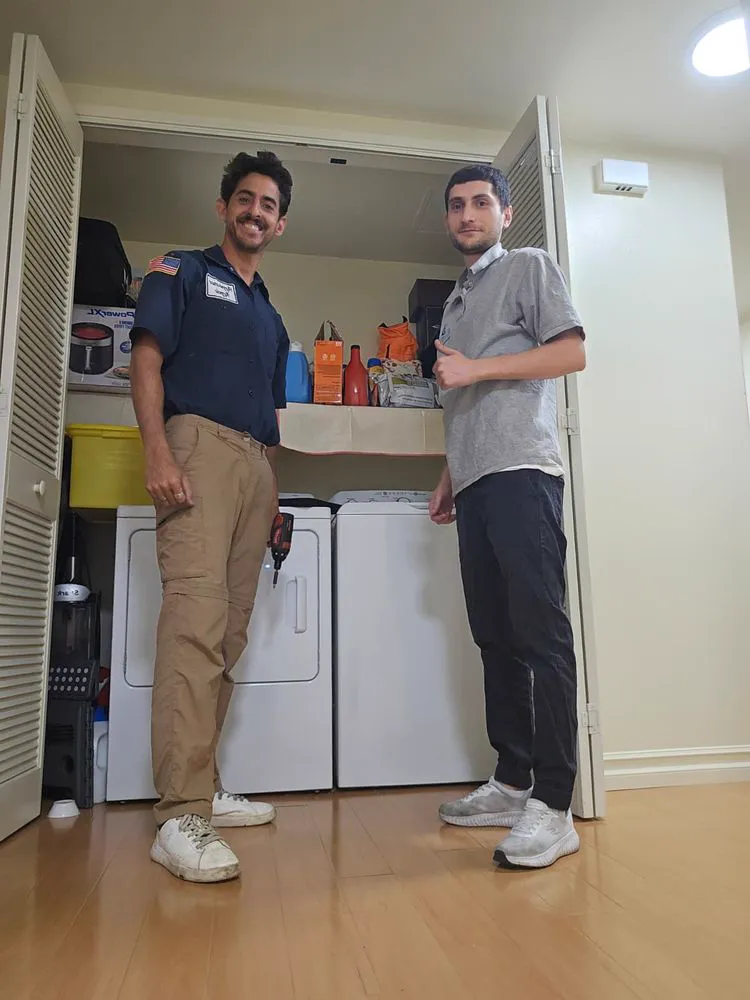 Customer with the technician after the job